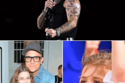 Pure Magic on Stage: Robbie Williams Drops the Bravado for a Beautiful Lullaby Duet with His Daughter at TW Classic—Fans Left in Tears!”