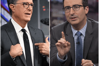 GET OFF THE STAGE, GREG’ — Four Words From Colbert, One Smile From Oliver, and the Room Erupted: In a Televised Clash No One Saw Coming, Stephen Colbert’s Cold Command Cut Through the Studio Like Glass, Freezing Greg Gutfeld in Place — Laughter Vanished, The Lights Felt Hotter, and the Audience Could Sense a Power Shift They Couldn’t Explain — Then, With a Slow, Knowing Smile, John Oliver Seemed to Seal the Moment — What Happened Next Turned a Routine Segment Into One of the Most Unforgettable and Unanswered Live TV Confrontations of 2025″