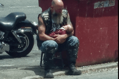 The biker cut off his own club’s patches to wrap a freezing newborn baby someone had abandoned in a dumpster in the parking lot.